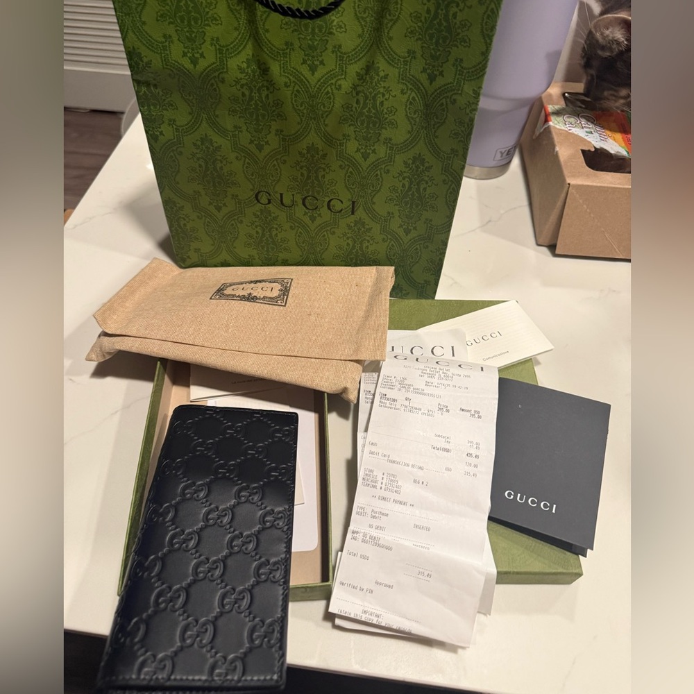 NWT Gucci Black Embossed Leather Wallet